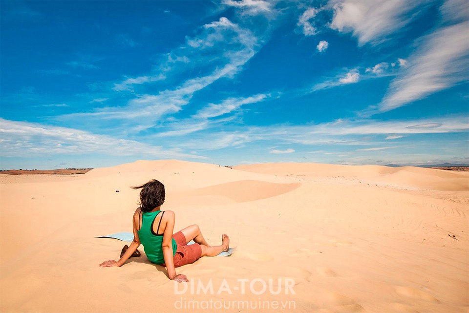 White sand dunes and lotus lake near Mui Ne, Vietnam